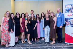 Students of the 2026 Werklund STARS Academy for Critical Care Transport Medicine Education pose for a photo alongside STARS President and CEO Dr. John Froh during a celebration of learning event held in Calgary in May 2026.
