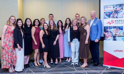 Students of the 2026 Werklund STARS Academy for Critical Care Transport Medicine Education pose for a photo alongside STARS President and CEO Dr. John Froh during a celebration of learning event held in Calgary in May 2026.