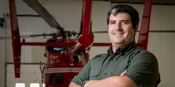 STARS Very Important Patient Marcus Hirschfield stands in front of an old STARS BK117 air ambulance helicopter during a visit to his nearest STARS base, in this older STARS file image.