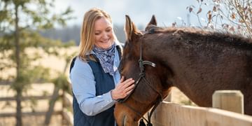 STARS Very Important Patient Maureen Schnirer strokes her horses nose while photographed at her property.