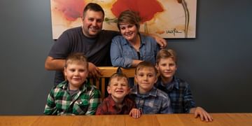 STARS Very Important Patient Bonnie Fortin poses with her husband and four children at their home.