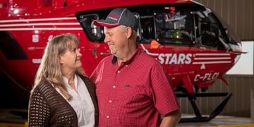 STARS Very Important Patient Clayton Orr smiles while talking to his wife Barbara during a visit to their nearest STARS base.