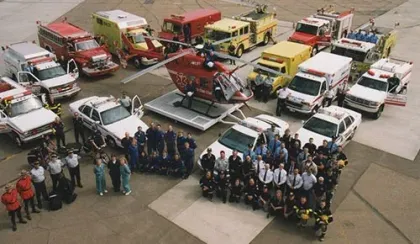 An early photo of Calgary first responders that includes STARS, fire department, city police and RCMP