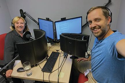 Mission Ready podcast hosts Deborah Tetley (left) and Lyle Aspinall (right) pose for a photo inside their recording studio during production of Season Two.