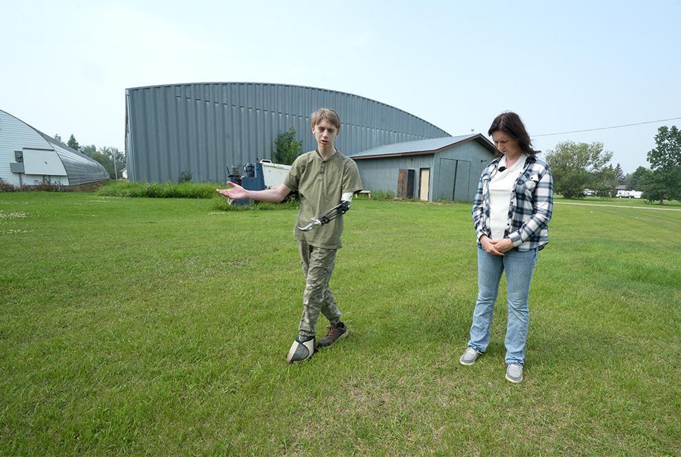STARS Very Important Patient photographed with is mother Christine at the site of his incident in Laird, SK.